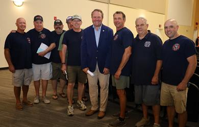 Commissioner Anderson in a group photo with firefighters at the caucus meeting Commissioner Anderson in a group photo with firefighters at the caucus meeting
